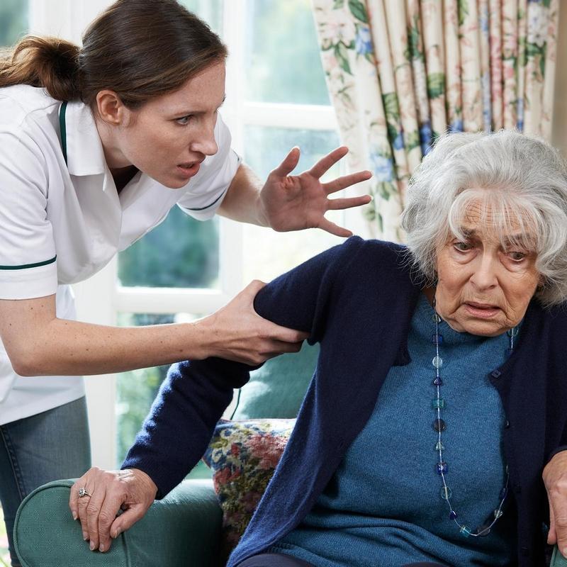 Nurse grabbing elder woman and screaming at her